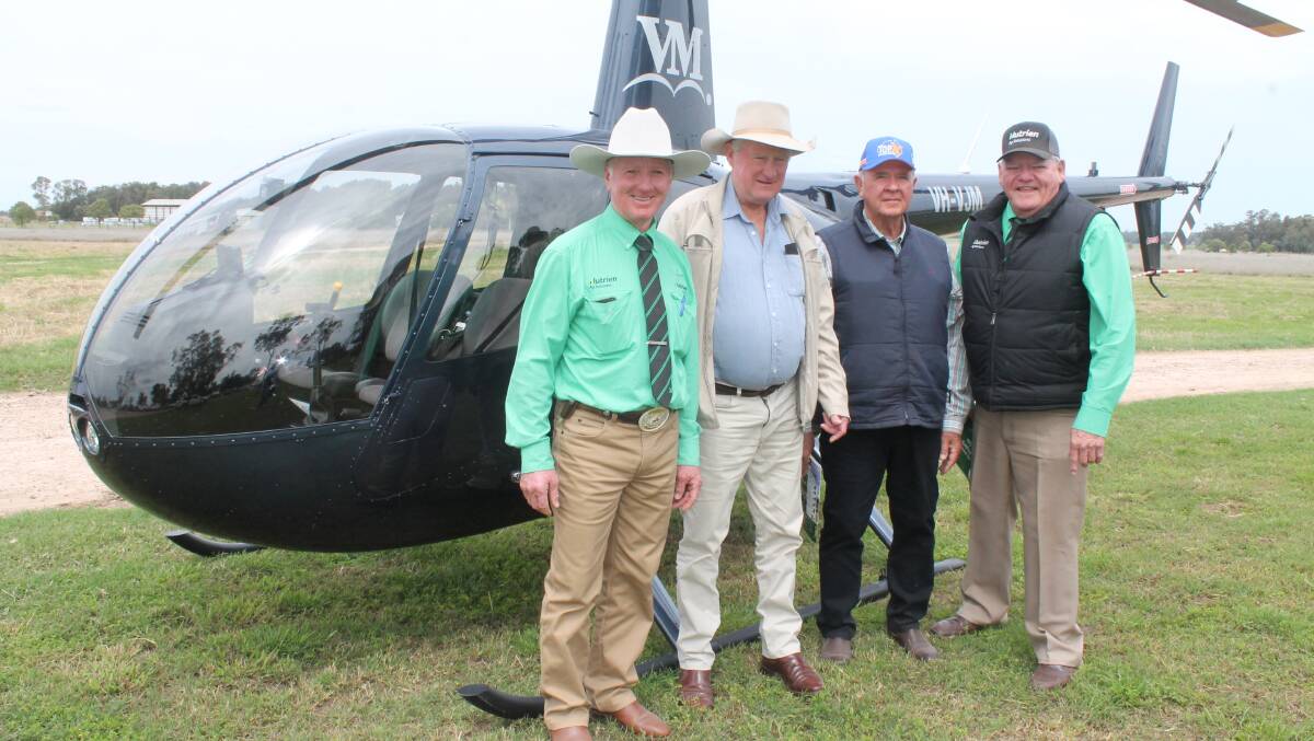 A new mode of transport for Terry Ryan, Nutrien, Chinchilla, John McLoughlin, Rainbow, Rolleston and his manager Gavin Hoad and Don Kelly, Nutrien, Injune. Mr McLoughlin paid the record Durham Black money of $46,000 for The Grove RO737.