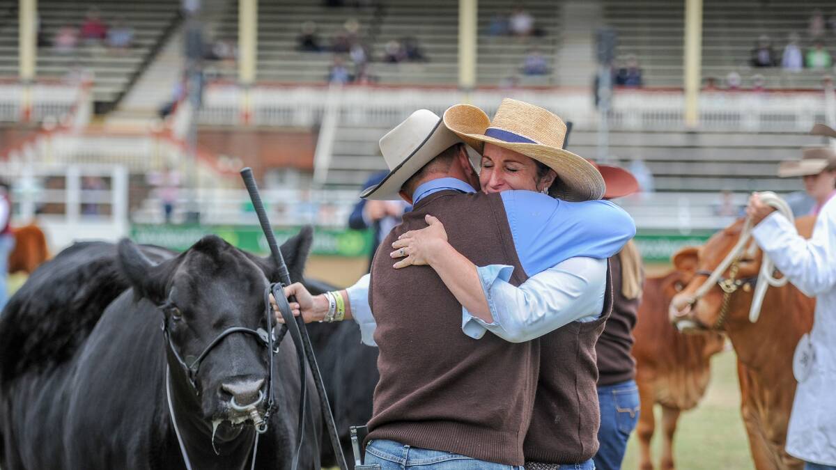 Glen Waldron and Kim Groner embrace after winning the interbreed female competition. Pictures: Lucy Kinbacher 