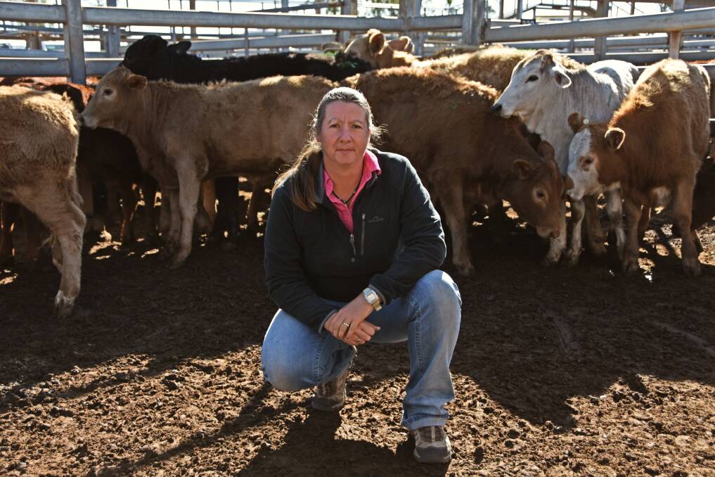 Marissa Proud, Hollymount, Wallumbilla, was among vendors offloading younger stock at the Roma store sale in a bid to retain their breeder herd during dry times.