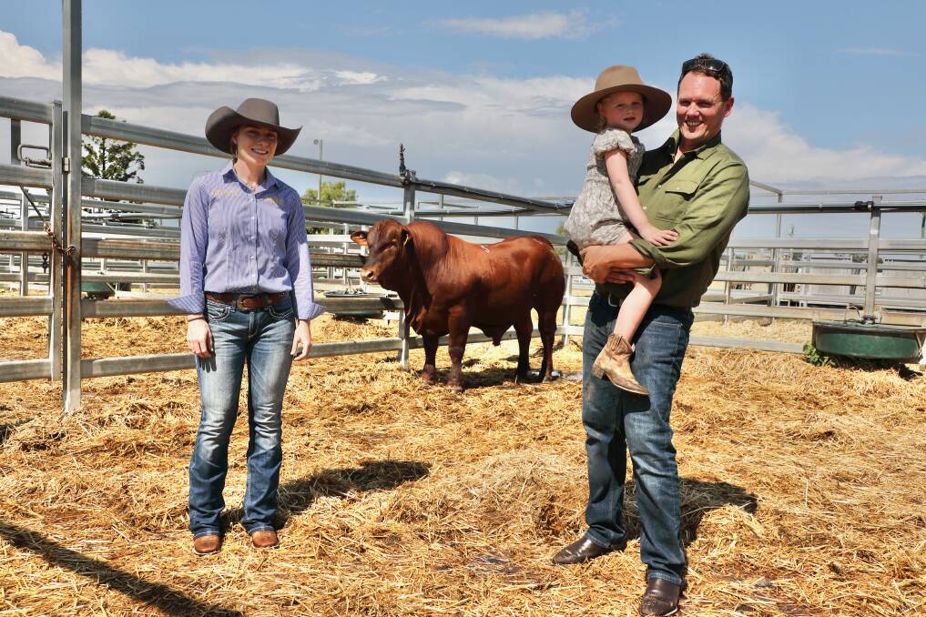 With the new breed record holder, the $45,000, 5 Star 210745 are Bonnie Maynard, 5 Star stud, Jambin and purchaser, Chris Simpson and his daughter Victoria, CAP Genomics, Harlin. Picture: Kent Ward 