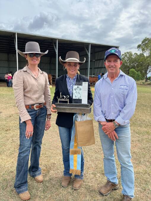 Libby Tones and Sean Morrissey present Kiralee Streeter (centre) with the Joe Tones Memorial Trophy for champion junior judge. Picture: Supplied 