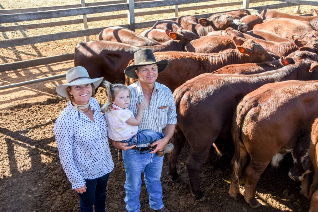 Tarina, Iris and Bruce Briscoe, Gooimbah, Injune, with their crossbred weaner steers at the Roma store sale on Tuesday. 