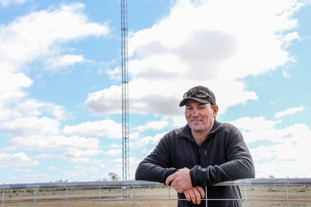 Andrew Sevil beside his 53 metre telecommunications tower.