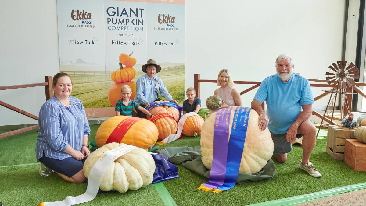 The giant pumpkin representatives (From left) Jen Finch, Tom Finch, 7, Jeff Buchann, Jimmy Finch, Taryn Watt and Jim Baxter. 