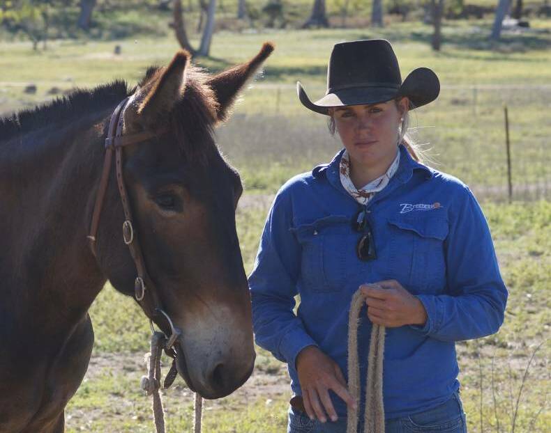 GOOD MATES: Livestock supervisor at B Feeders, Rodgers Creek, Kelly Dudley, with her mule.