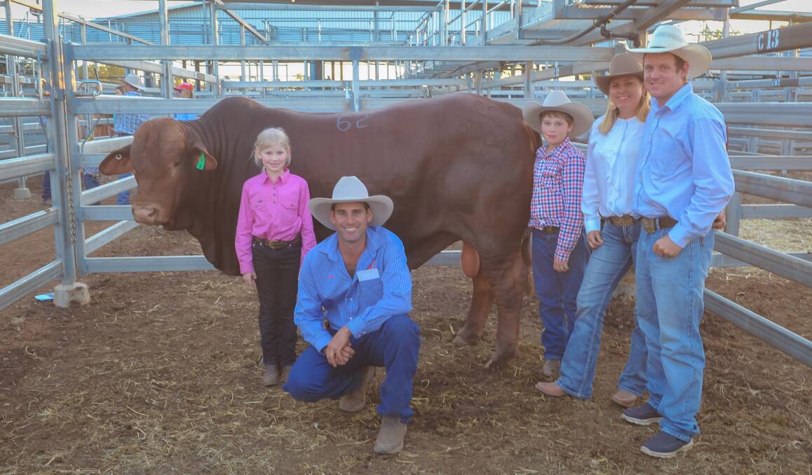 Lara, Steve and Hamish Farmer with their bull, SC Leeroy, and purchasers Kylie Graham and Mat Durkin, Mungalla stud, Taroom. Picture by Kelly Butterworth