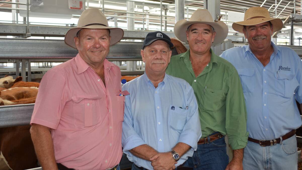 "The shirt colour didn't matter." Here's Rob Bolton (far right) enjoying a chat with Peter Homann from Elders, Andy Madigan from ALPA, and Mark Barton from Landmark, during the opening of the Northern Victorian Livestock Exchange in 2015.