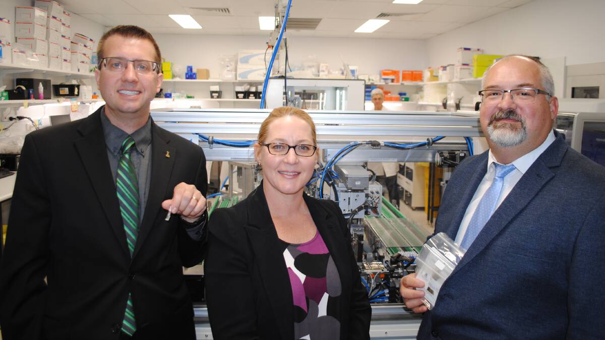 Neogen Corporation vice president of corporate development, Dr Jason Lilly;  Department of State Development executive director Karen Wiik; and Neogen Australasia general manager Dr Russell Lyons at the opening of the new livestock DNA testing laboratories at Gatton.