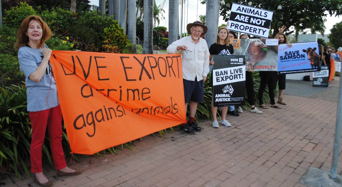 Protestors outside the LIVExchange conference in Townsville on Wednesday morning.