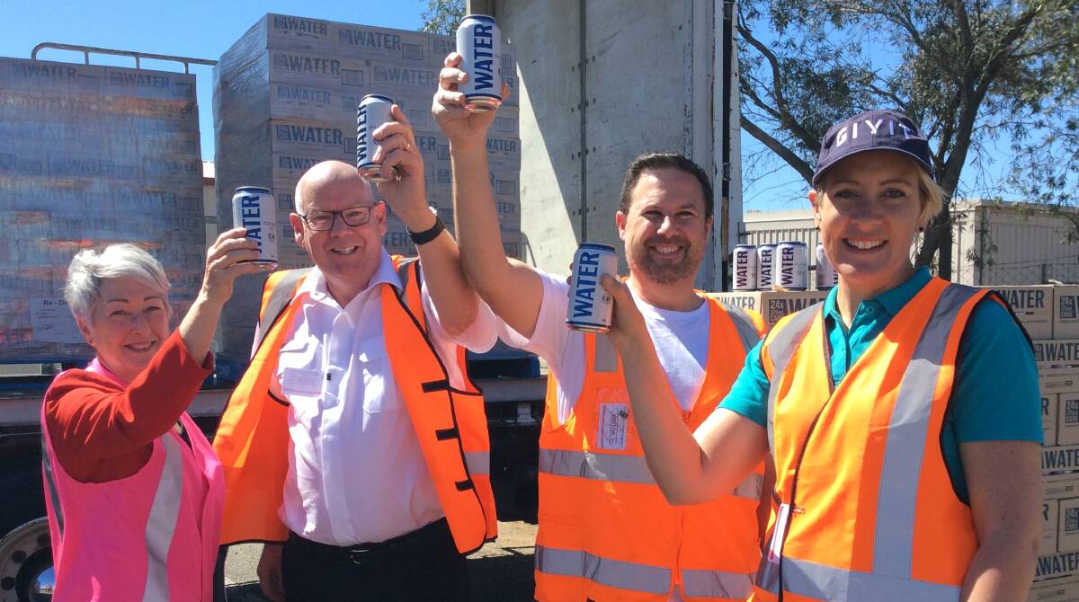 HERE'S CHEERS: Southern Downs Mayor Tracy Dobie, Captain Richard Hardaker from the Salvation Army, Julian Sheezel, CUB, and Caet Young, Givit.