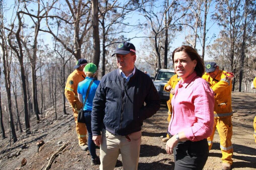 FIRE STORM: LNP Opposition Leader Deb Frecklington (right) and Member for Scenic Rim, Jon Krause, inspecting the devastation near Canungra.