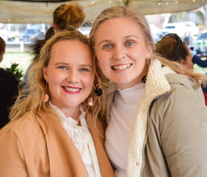 Carly Cooper, Wheatvale, and Emily Ranger, Pilton, at Risden Park, enjoying Warwick Rugby Union Club's annual Ladies Day.