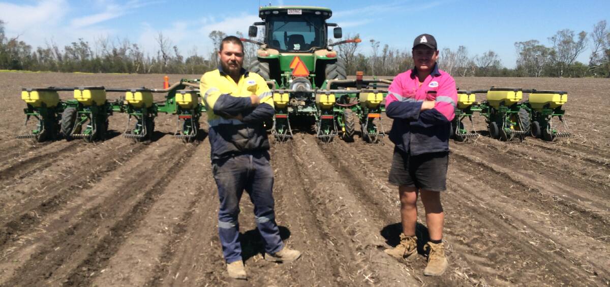 ON TRACK: Tim Sauverain and Josh Miller planting 400 hectare of cotton on DA Hall and Co's country at Yandilla.