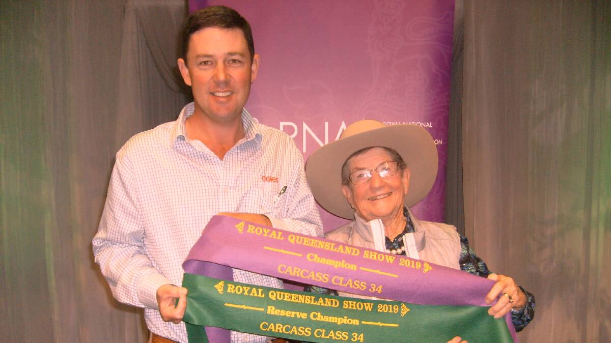Jim Hutchinson, Coles Supermarkets, with champion carcase and reserve champion carcase award winner Girlie Goody, Malakoff, Monto.