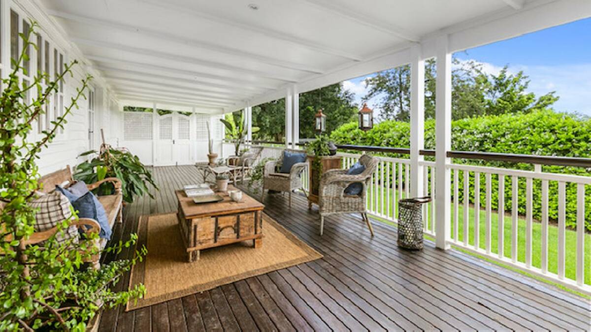 The homestead has an expansive verandah and a screened barbecue porch, both with views over the paddocks. 