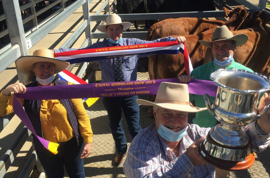 EKKA WINNER: Tom Surawski (front), Mountain View, Croftby, with RNA councillor Liz Allen, Craig Bell, Nutrien, and judge Anthony Griffiths, JBS, Australia, with the Queensland Country Life grand champion pen of the 2021 Ekka.