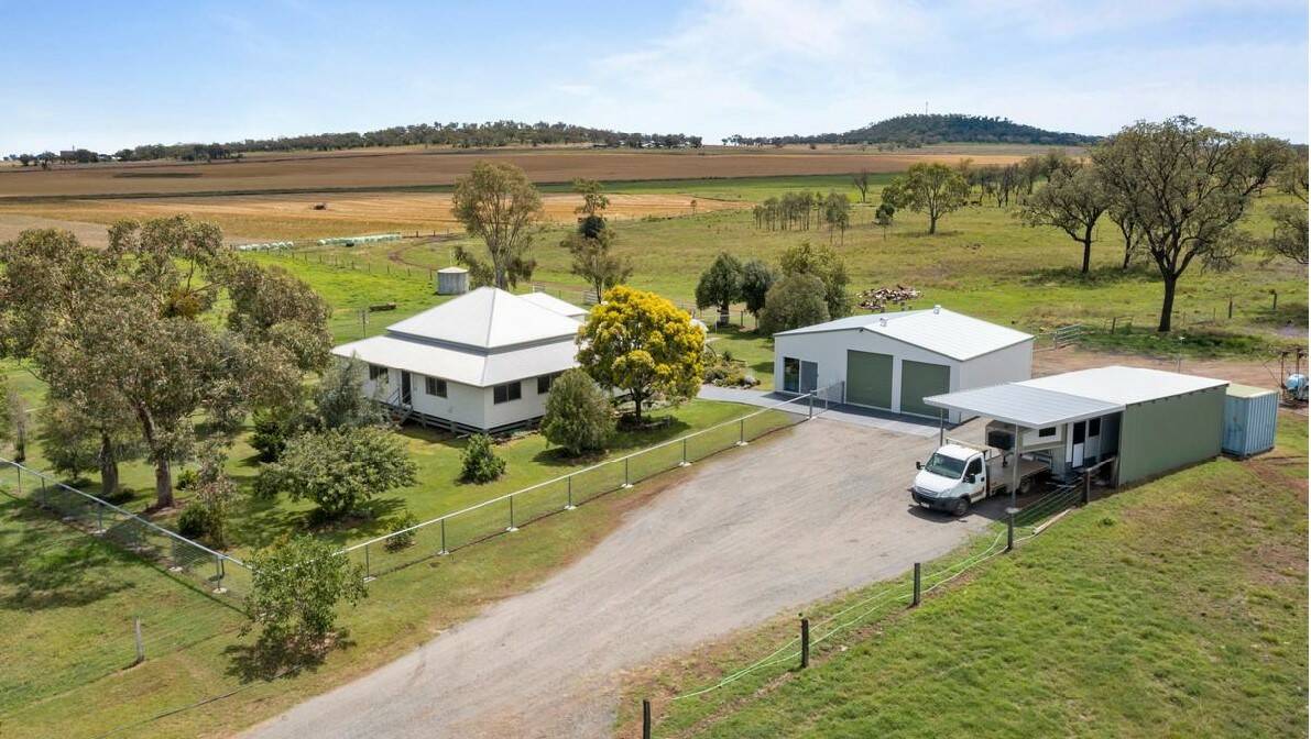 El Rita's improvements include a three bedroom Queenslander-style home and sheds.
