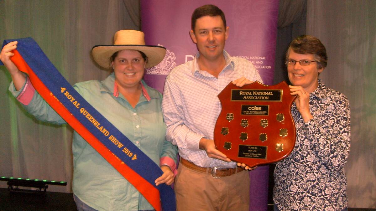 Coles Supermarkets pen of three award winners Andrea Taylor and Kayleen Taylor, MK Cattle, Murgon, with Jim Hutchinson, Coles.