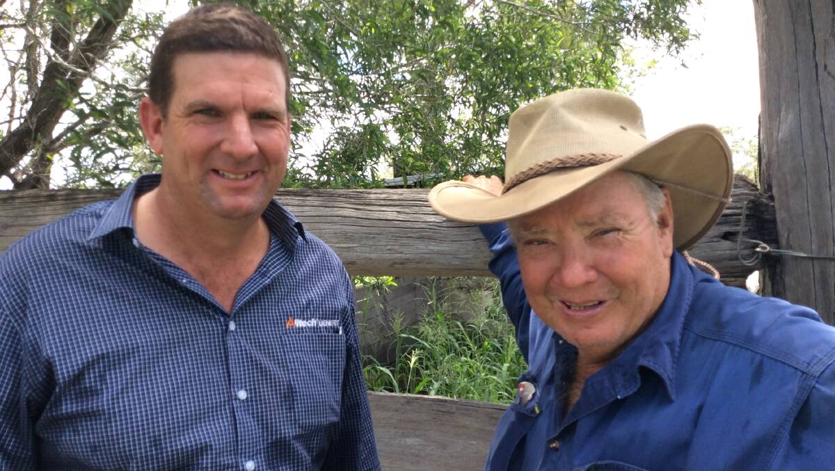 Gin Gin cattleman Dennis Neller (right) and Alltch Lienert Australia nutrition adviser Toby Doak.