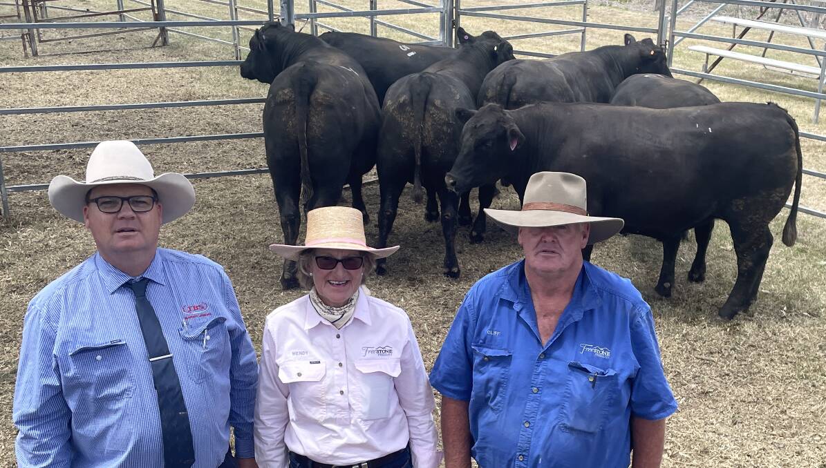 Export cattle judge David Musch, JBS Australia, with Wendy Bryce and Cliff Shelley, Kingsford Farms, Freestone, the exhibitors of the champion pen of export cattle at the annual Moreton Show and Sale. Picture Mark Phelps