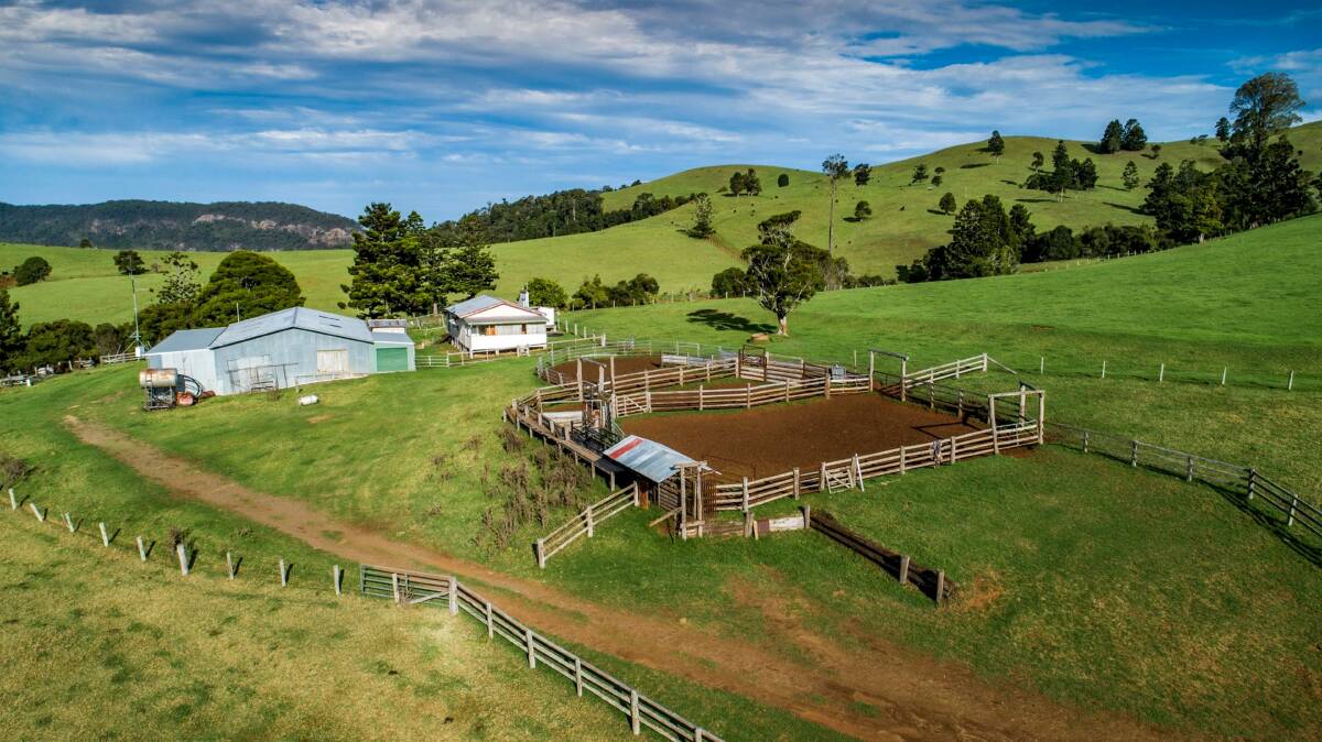 Improvements include two dwellings, sheds, and three sets of cattle yards.