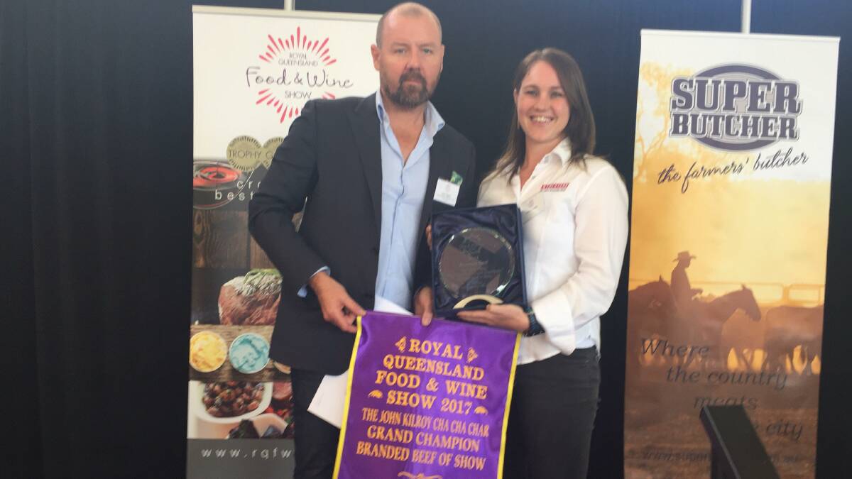 Cha Cha Char general manager Chris Higgins and Sophie Kennedy being presented with the trophy for Stockyard’s winning Wagyu Kiwami entry.