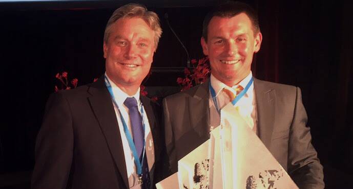 AWARD WINNER: Invasive Animals CRC chief executive officer Andreas Glanznig with FeralScan program manager, Peter West, receiving the minister’s award for a Cleaner Environment in the field of Research and Science excellence at the Banksia Foundation 2016 Awards.