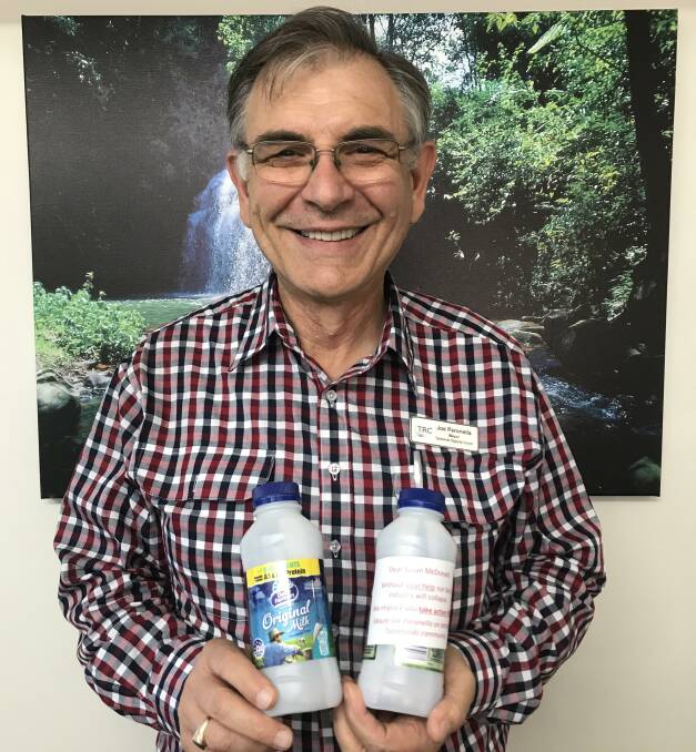 Tablelands Mayor Joe Paronella with the message in a bottle to be delivered to politicians tomorrow.