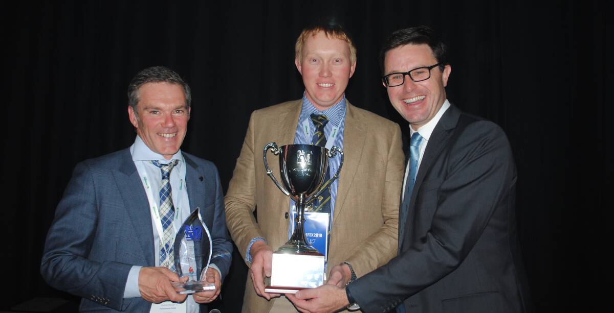 Young Lotfeeder of the Year: Ben Attewell (centre), with sponsor Scott Sloss, Performance Feeds, and Agriculture Minister David Littleproud. 