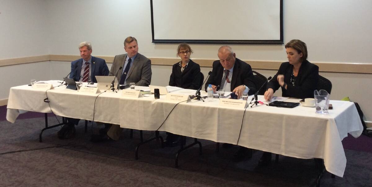 The Legal Affairs and Community Safety Committee chaired by Peter Russo (second from right). 